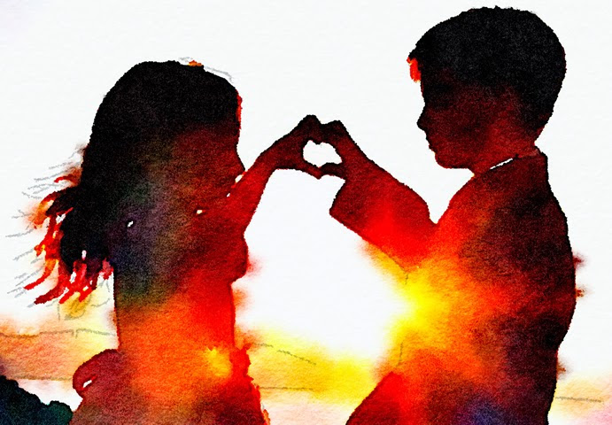 Boy and girl making a heart shape